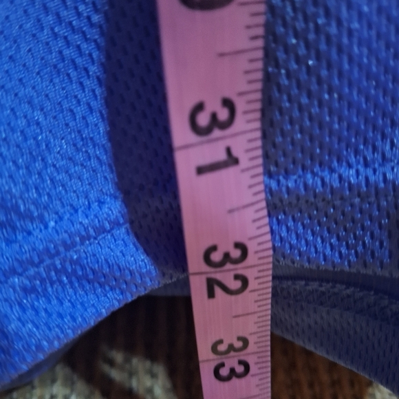 A Jerzees Blue V-Neck Men's Shirt in a Mens Size Large. - Picture 6 of 7